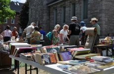 "Ottawa, Canada - May 29, 2010:  Thousands of people gather at the annual Glebe neighborhood garage sale which takes place for several blocks in the Glebe area of Ottawa."
